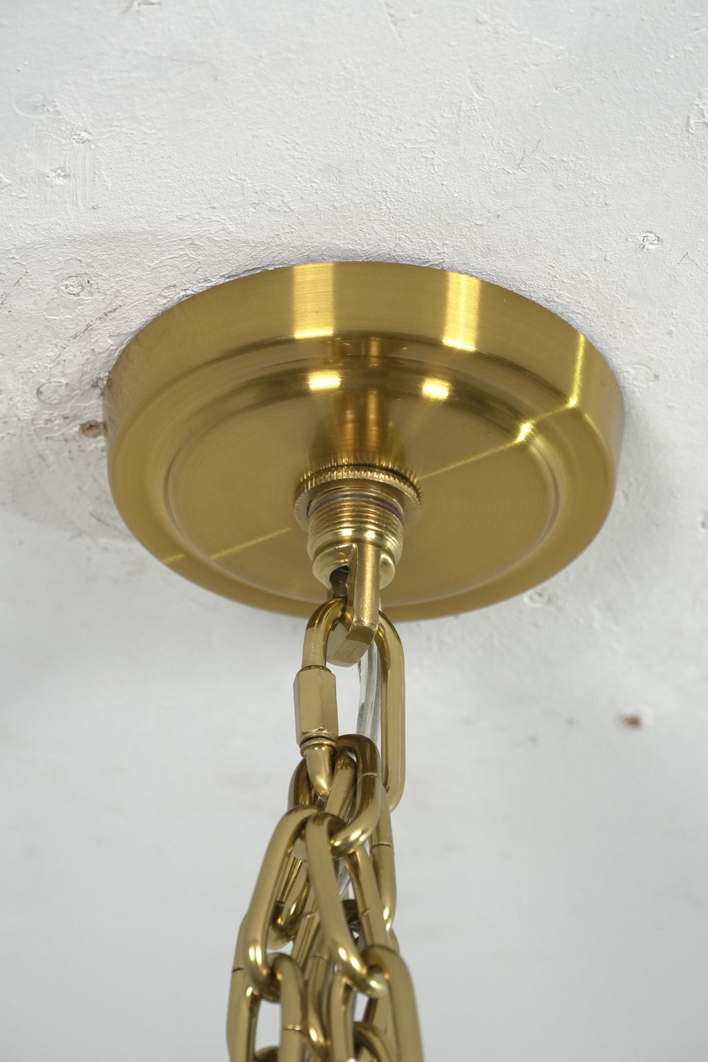 Celestial Glass Cascade Chandelier ceiling mount with gold finish and decorative chain connection.
