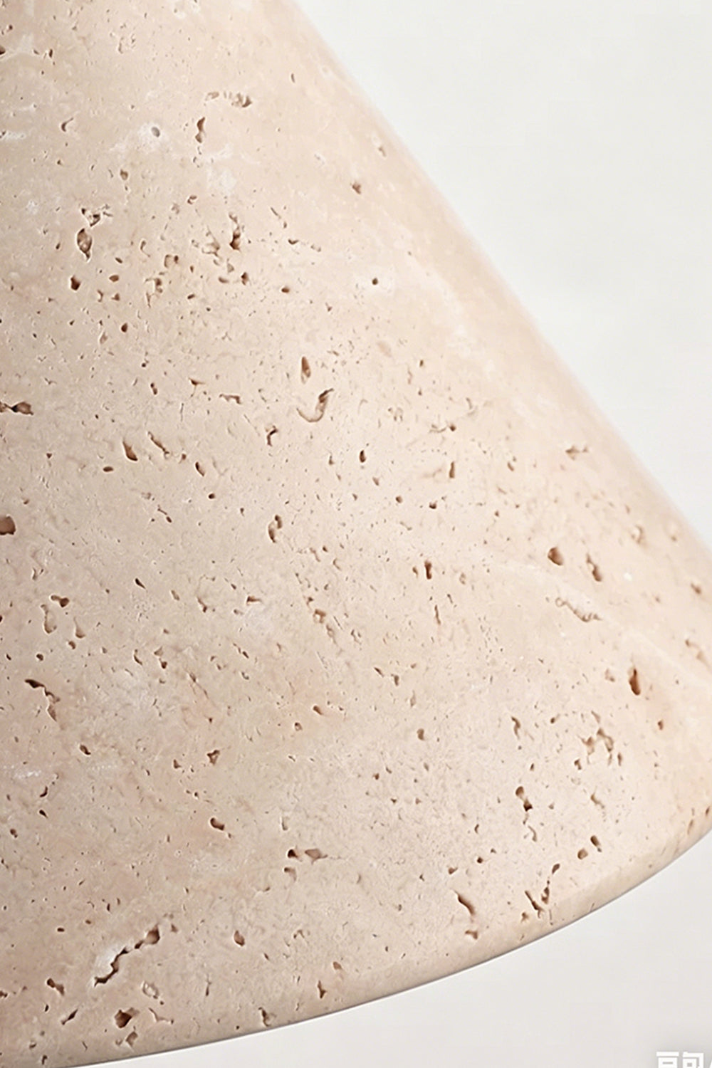 Vesper Cone Travertine Wall Light | Travertine | Macro shot of porous travertine stone texture | vexa lamps