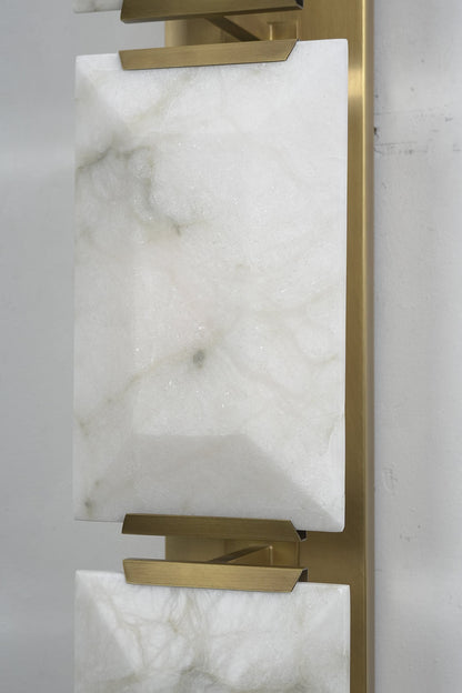 Detailed close-up of faceted alabaster stone panels | Alabaster | Showing the natural grain and geometric surface | vexa lamps