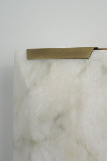 Brass cap detail of alabaster wall lamp | Brass, Alabaster | Close-up showing the metallic edge and stone texture | vexa lamps