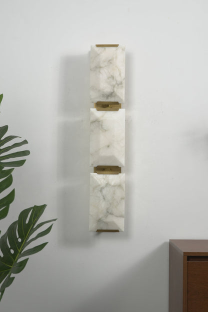 Lit 3-panel rectangular alabaster wall lamp with brass accents | Brass, Alabaster | Front view isolated on white background | vexa lamps
