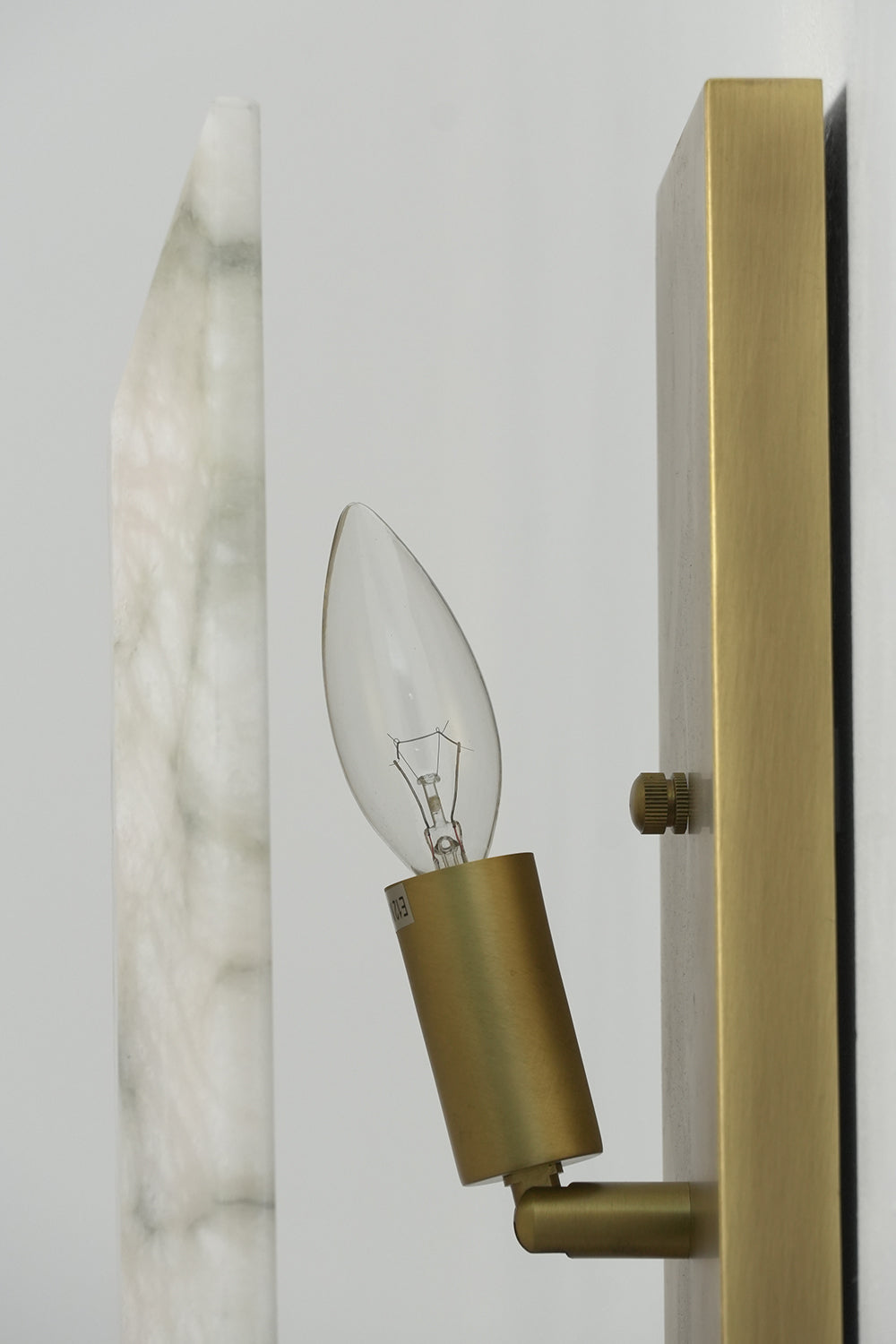 Internal view of alabaster wall sconce with bulb | Brass, Alabaster | Showing the candle bulb and brass socket | vexa lamps