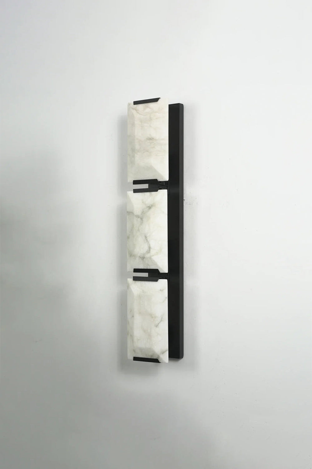 Unlit 3-panel alabaster wall lamp in black finish | Metal, Alabaster | Front view on gray background | vexa lamps