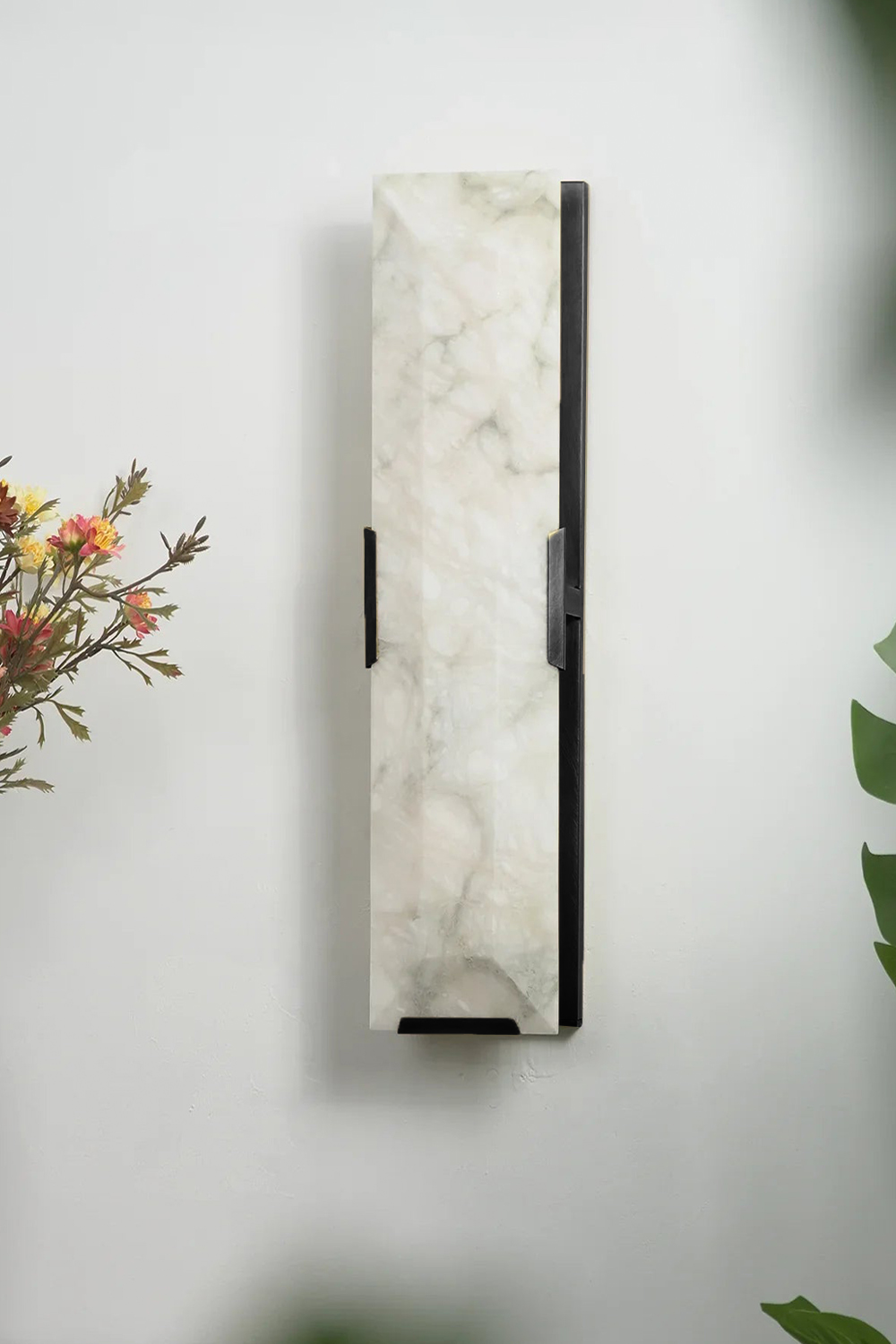 Unlit black-finish alabaster wall lamp | Metal, Alabaster | Detail view of stone texture and dark hardware | vexa lamps