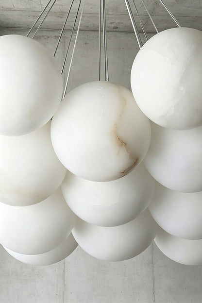 Amandine Alabaster Globe Cluster Pendant Light showcasing elegant clustered design with alabaster globe elements.