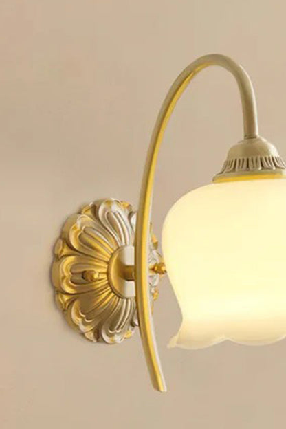 Amelie Vintage Tulip Wall Lamp with frosted glass shade and ornate brass backplate.