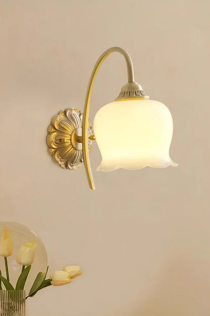 Amelie Vintage Tulip Wall Lamp with frosted glass shade and antique brass backplate, perfect for vintage decor.
