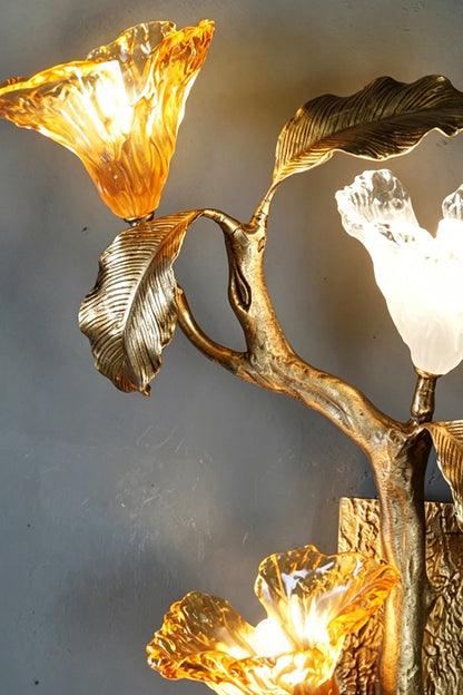 Arboreal Bloom Brass Wall Lamp | Brass, Glass | Close-up of the glowing textured glass flower-like shades | Detail shot | vexa lamps