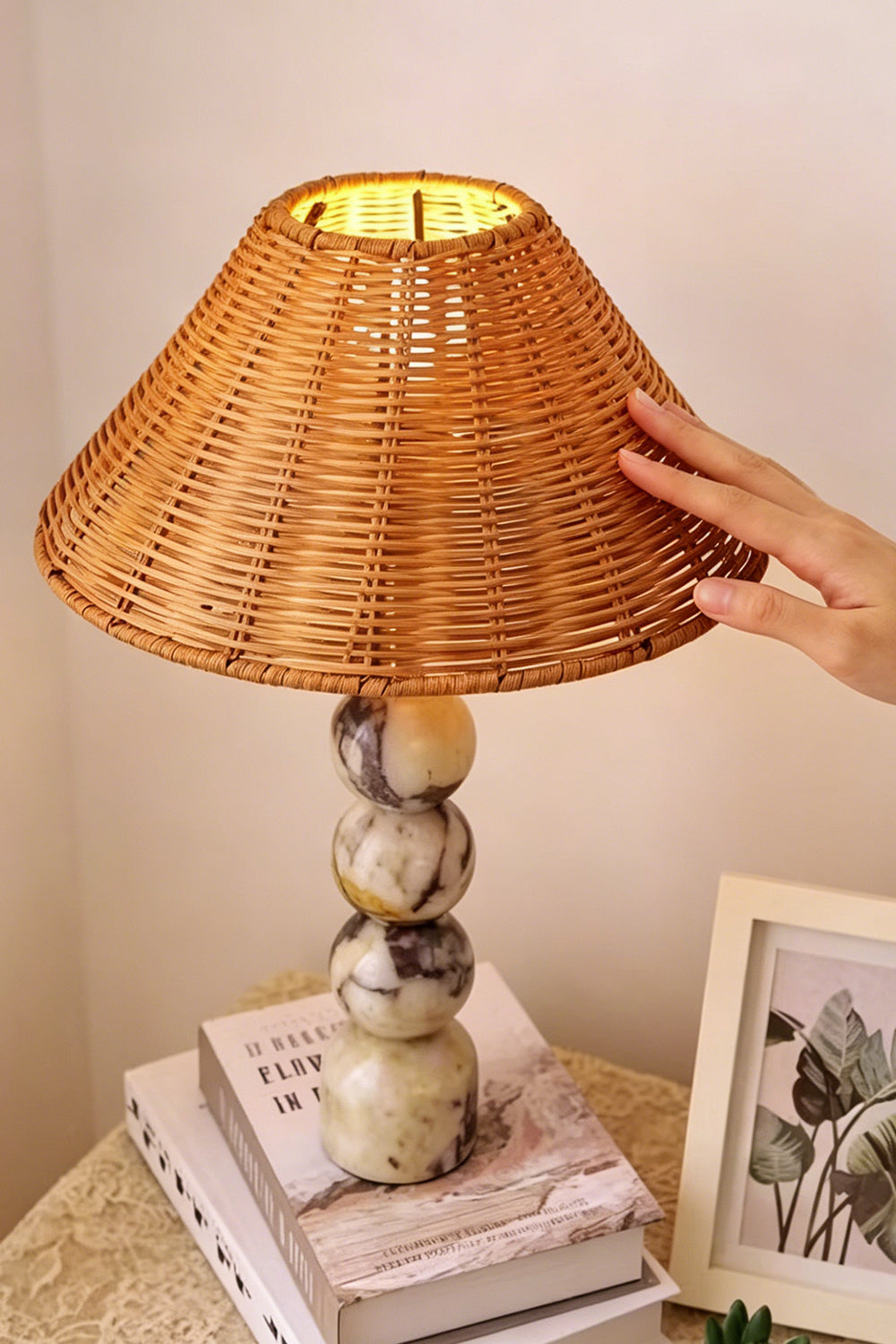 Aria Rattan & Stacked Marble Table Lamp featuring a woven rattan shade and stacked marble base.