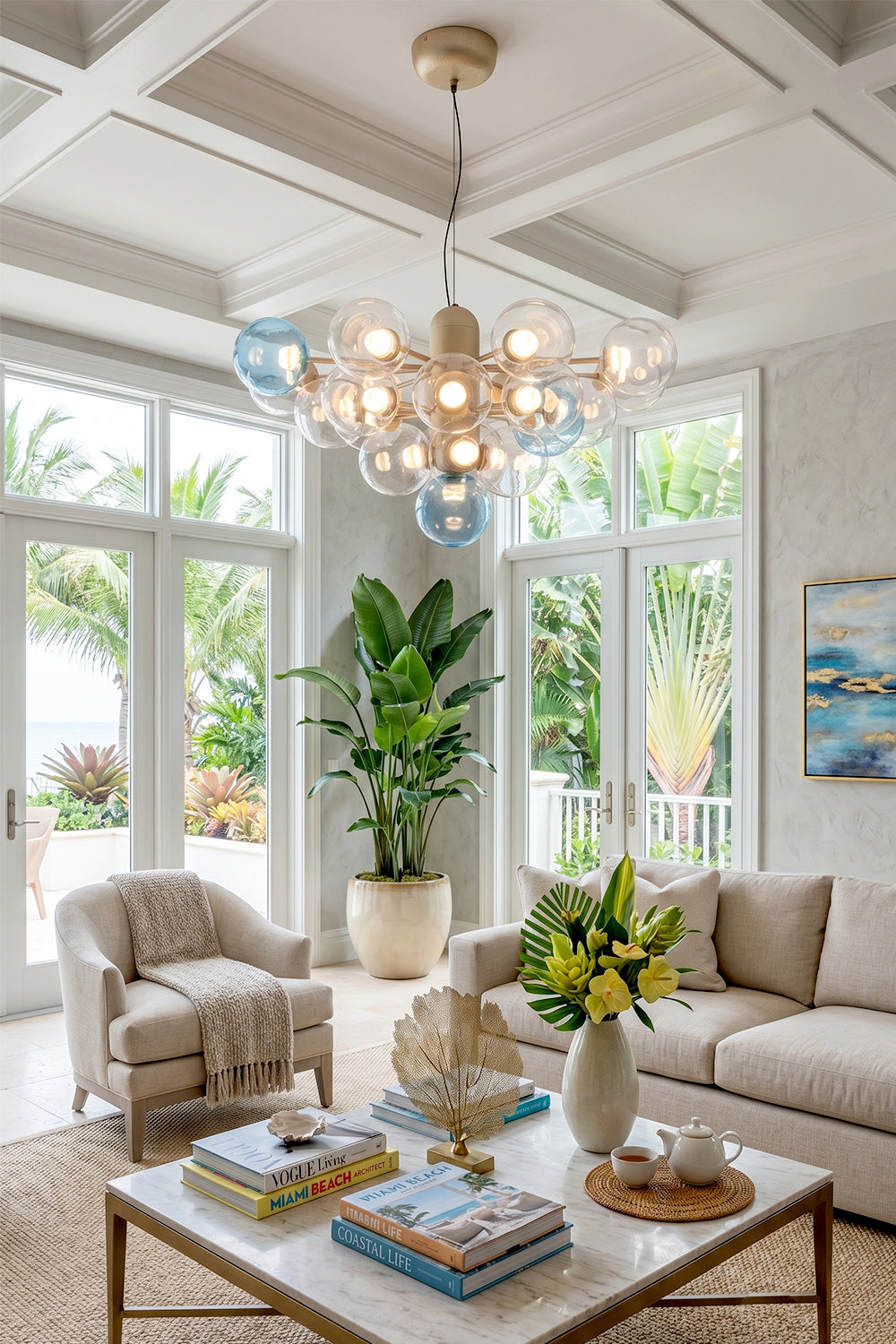 Astraea Prismatic Globe Chandelier | Glass, Metal | Styled beautifully in a spacious bright open-concept living space with a white paneled ceiling and neutral furniture layouts | vexa lamps