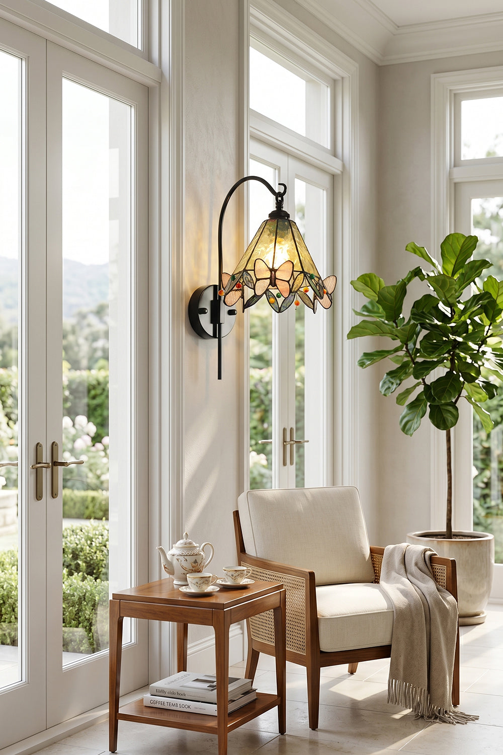 Aura Vine Stained Glass Wall Sconce | Glass, Metal | Providing a warm glow in a sunlit room corner with a comfortable white armchair and a small wooden side table near French doors | vexa lamps