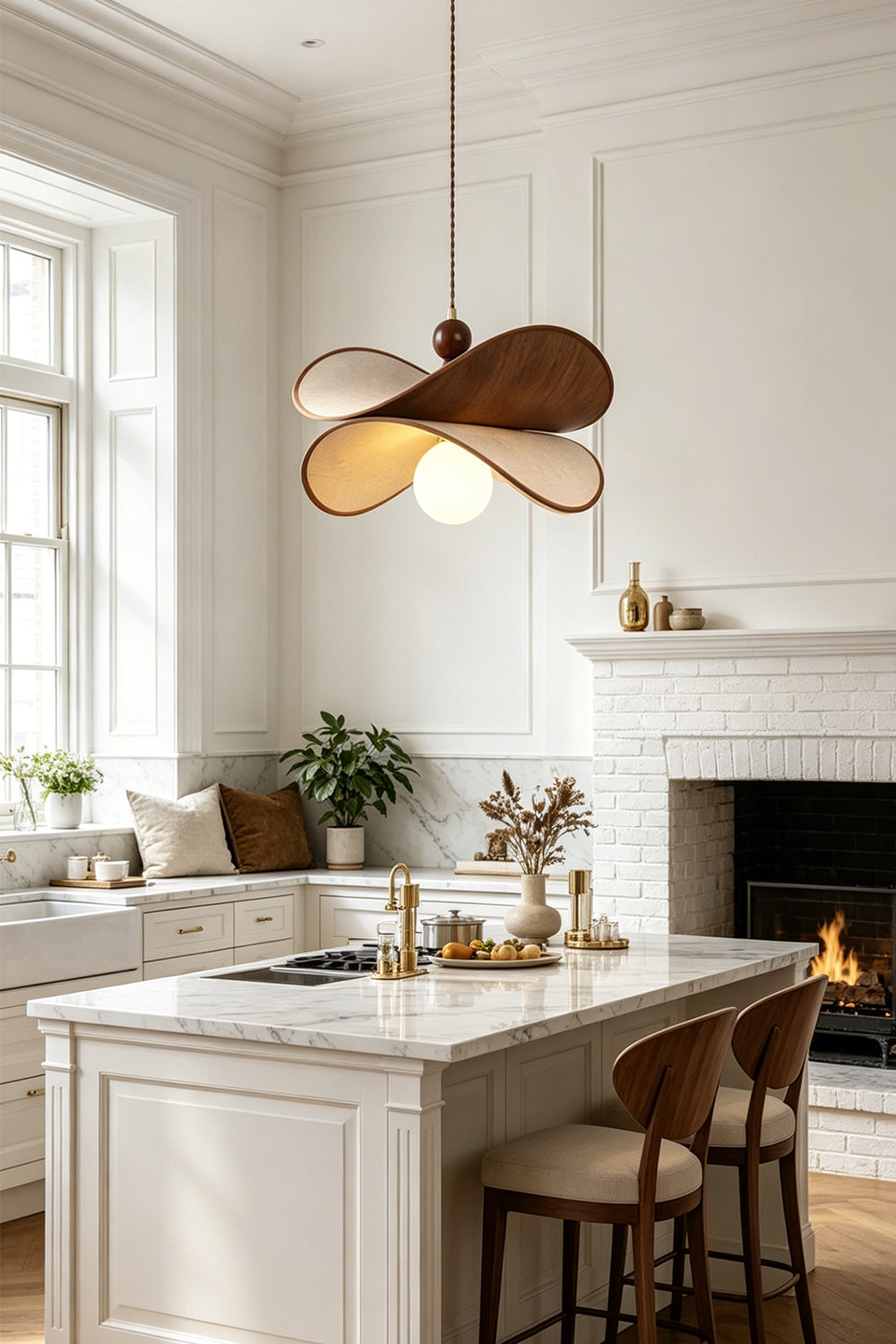 Aurelia Blossom Glass Pendant Light | Wood, Fabric, Glass | Suspended elegantly above a pristine white kitchen island counter with matching bar stools near a burning fireplace | vexa lamps
