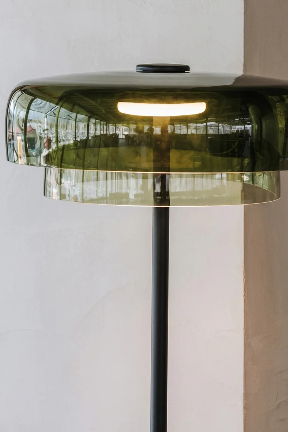 Aven Minimalist Architectural Floor Lamp | Glass, Metal | Close-up focus on the vibrant green glass shade variant showcasing the dual-layer translucent design and internal LED light tube | Detail shot | vexa lamps