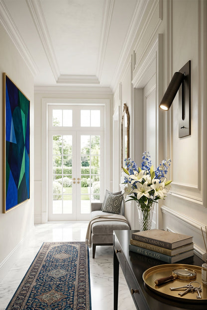 Axial Pivot Folding LED Wall Lamp in an elegant hallway with floral decor and art.
