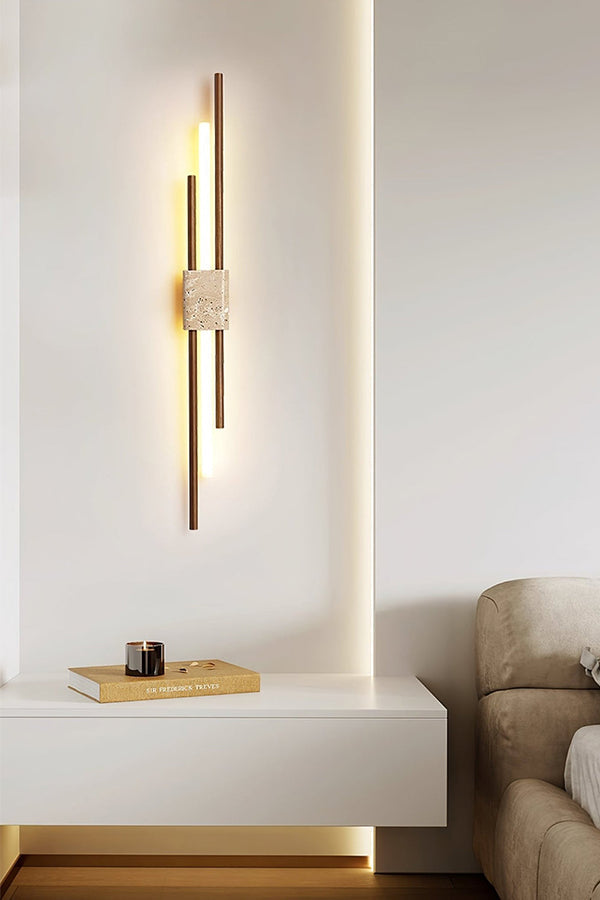 Axis Terra wall light above a floating console | Travertine, Metal, Glass | Living room scene with modern decor | vexa lamps