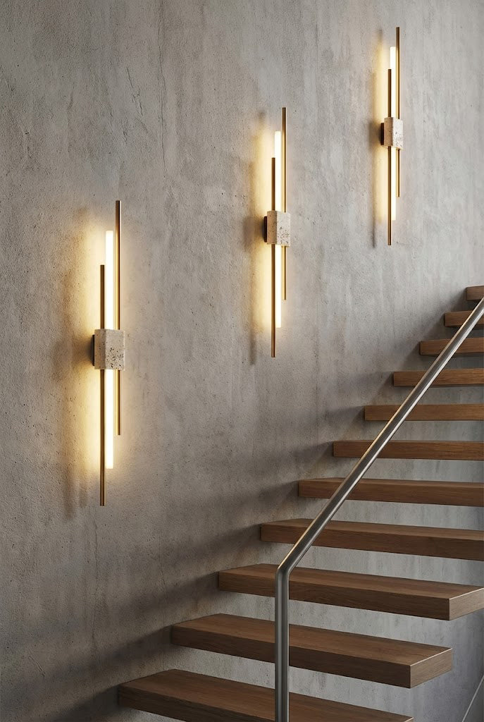 Trio of Axis Terra wall lights on a staircase wall | Travertine, Metal, Glass | Modern lighting installation in a stairwell | vexa lamps