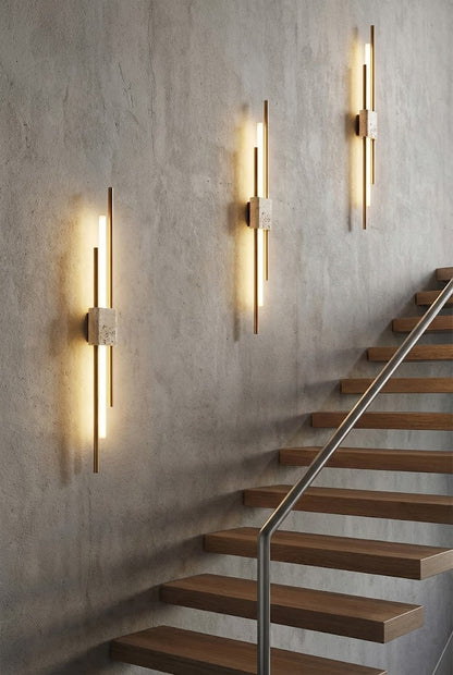 Trio of Axis Terra wall lights on a staircase wall | Travertine, Metal, Glass | Modern lighting installation in a stairwell | vexa lamps