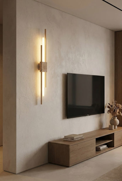 Linear Axis Terra wall sconce next to a TV | Travertine, Metal, Glass | Modern living room wall lighting | vexa lamps