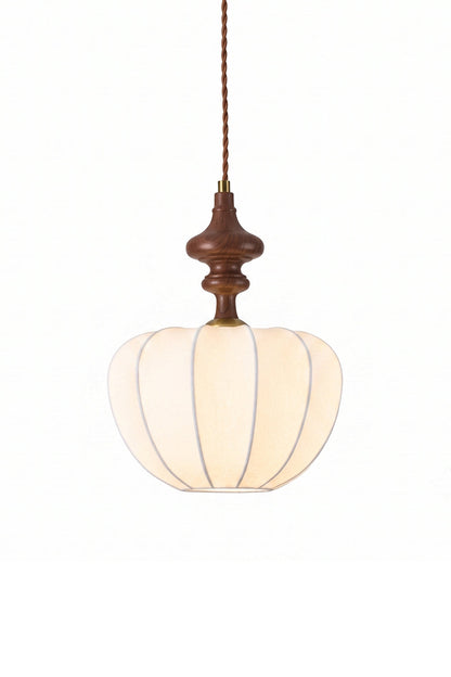 Baird Mid-Century Silk Pendant Light featuring a pumpkin-shaped silk shade and walnut-toned wooden spindle.