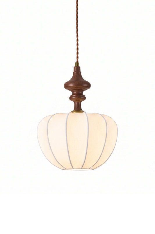Baird Mid-Century Silk Pendant Light featuring a pumpkin-shaped silk shade and walnut-toned wooden spindle.