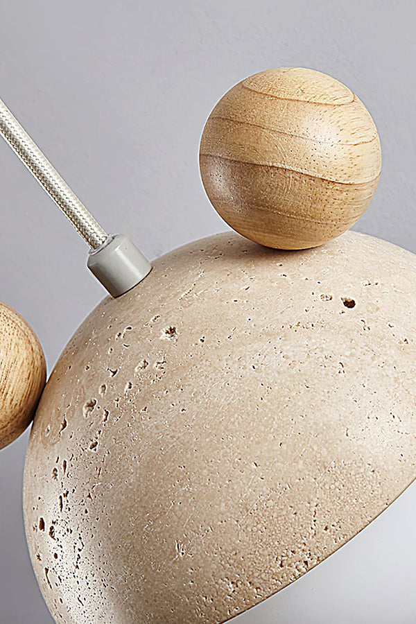 Close-up of travertine texture and wooden ear detail | Travertine, Metal, Glass | Macro shot showing the porous stone surface | vexa lamps