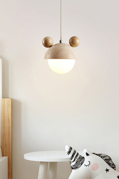 Playful bear ear pendant lamp in a kids' area | Travertine, Metal, Glass | Positioned over a white table with toy unicorn | vexa lamps