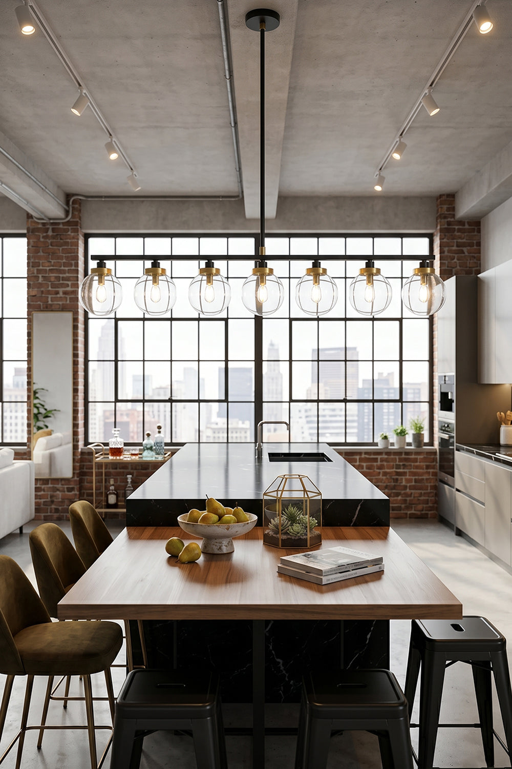 Brooks Linear Glass Globe Chandelier | Glass, Metal | Installed as a bold centerpiece over a long rustic wooden community table with a matching bench in an industrial style space | vexa lamps
