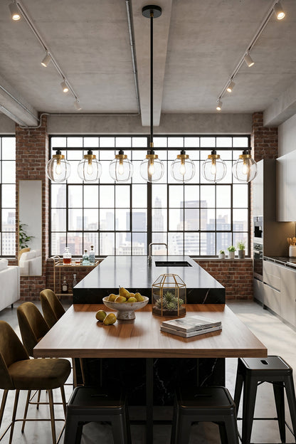 Brooks Linear Glass Globe Chandelier | Glass, Metal | Installed as a bold centerpiece over a long rustic wooden community table with a matching bench in an industrial style space | vexa lamps