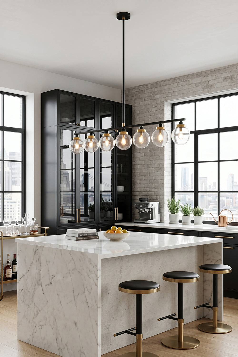 Brooks Linear Glass Globe Chandelier | Glass, Metal | Staged over a luxurious white marble waterfall kitchen island with sleek black barstools in a bright minimalist home layout | vexa lamps