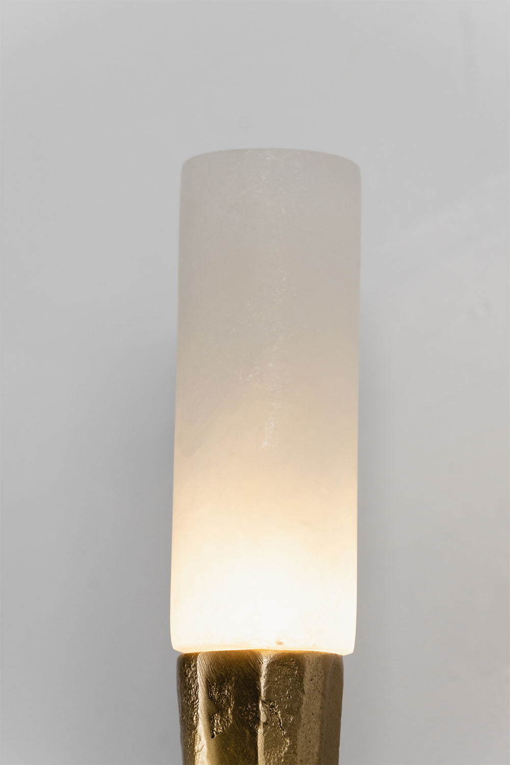 Bryony Torch Alabaster Brass Wall Lamp showcasing a stylish alabaster shade and brass base, perfect for elegant lighting.