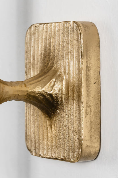 Close-up of the Bryony Torch Alabaster Brass Wall Lamp showcasing its elegant gold finish.