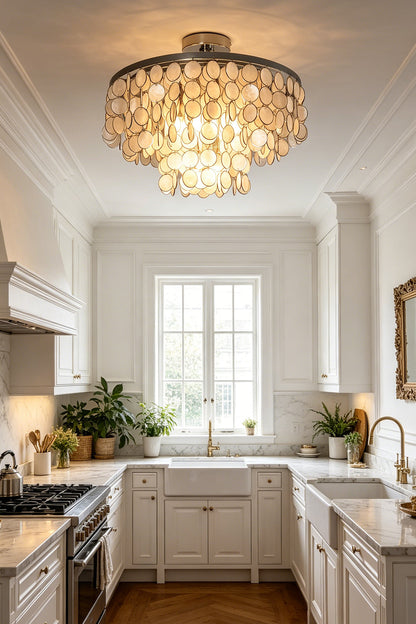 Capiz shell disc ceiling lamp | Shell | Iron | Installed in a bright kitchen with white cabinetry and island | vexa lamps
