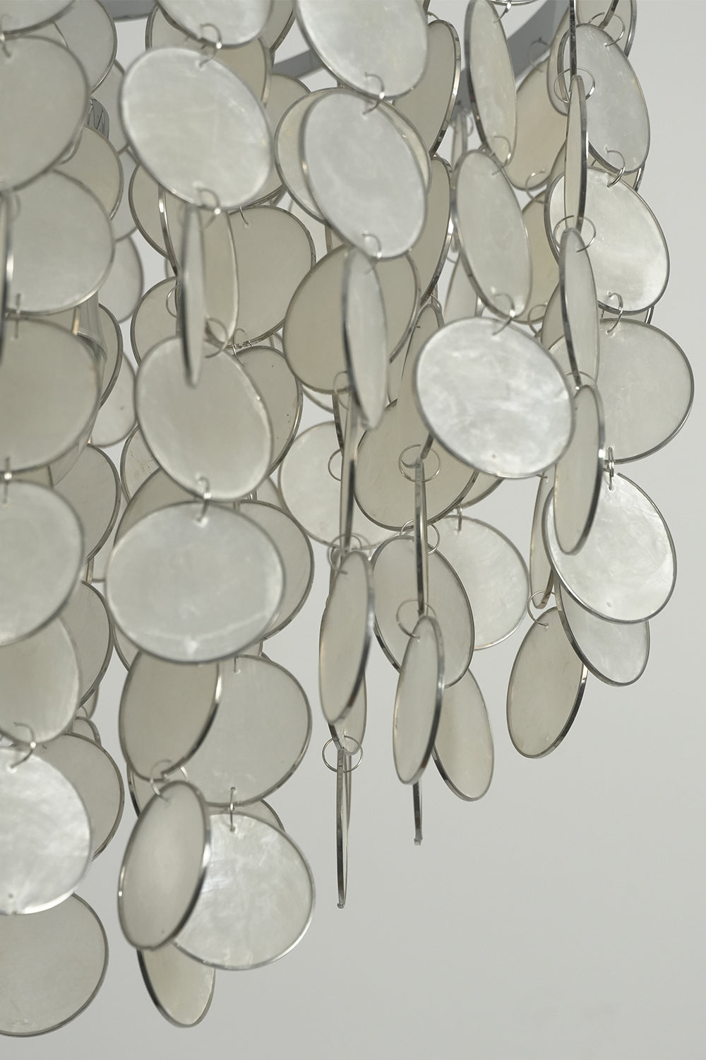 Natural Capiz shell disc texture | Shell | Macro shot of the iridescent surface of unlit shells | vexa lamps