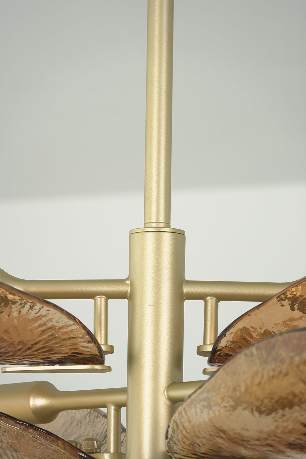 Brass central rod and glass branch connection detail | Metal, Glass | Functional close-up of the Cardiff chandelier frame | vexa lamps
