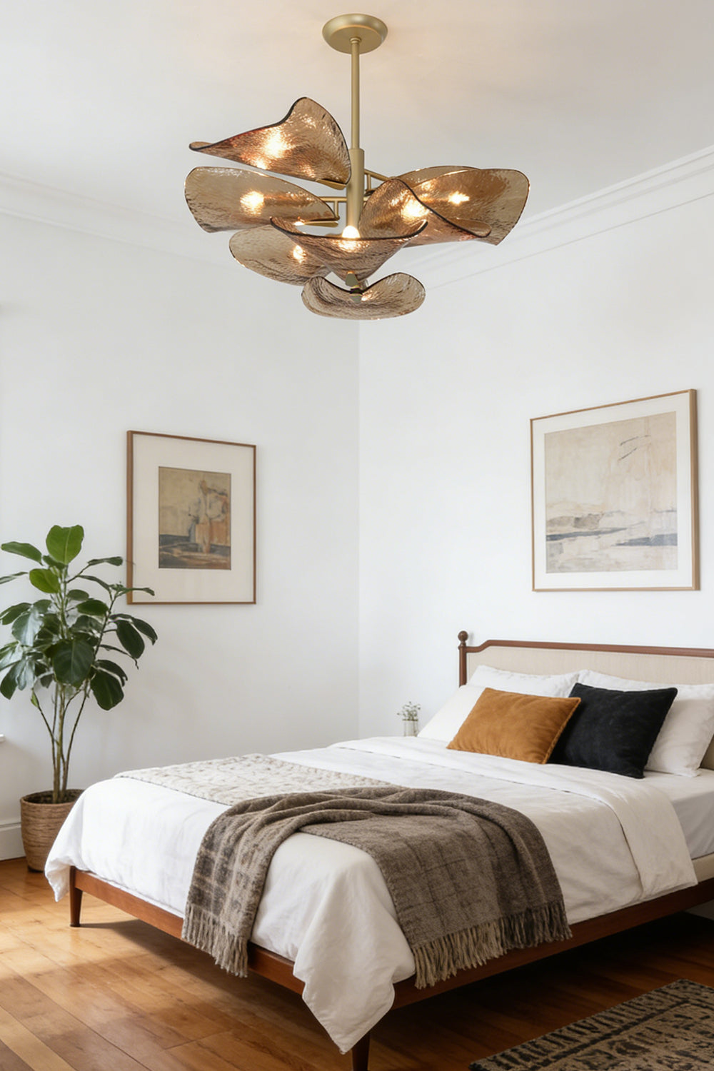 Cardiff Textured Wave Chandelier | Metal, Glass | Installed in a modern bedroom over a white bed | vexa lamps