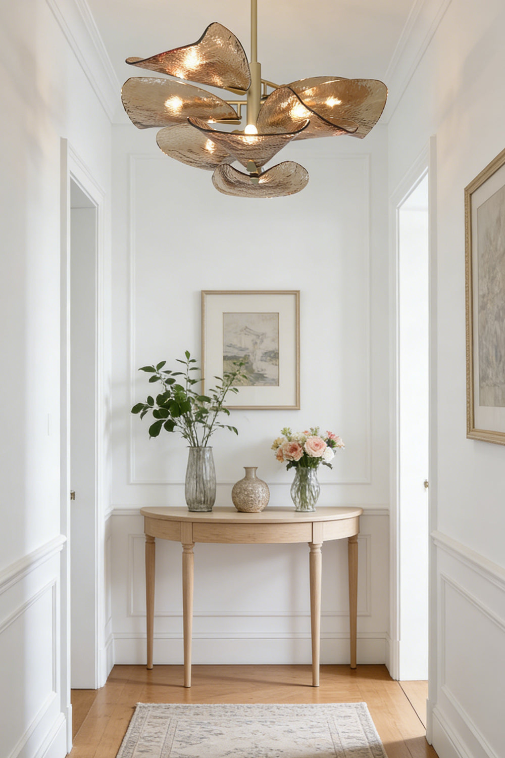 Cardiff Textured Wave Chandelier | Metal, Glass | Hanging in a bright hallway corridor over a console table | vexa lamps
