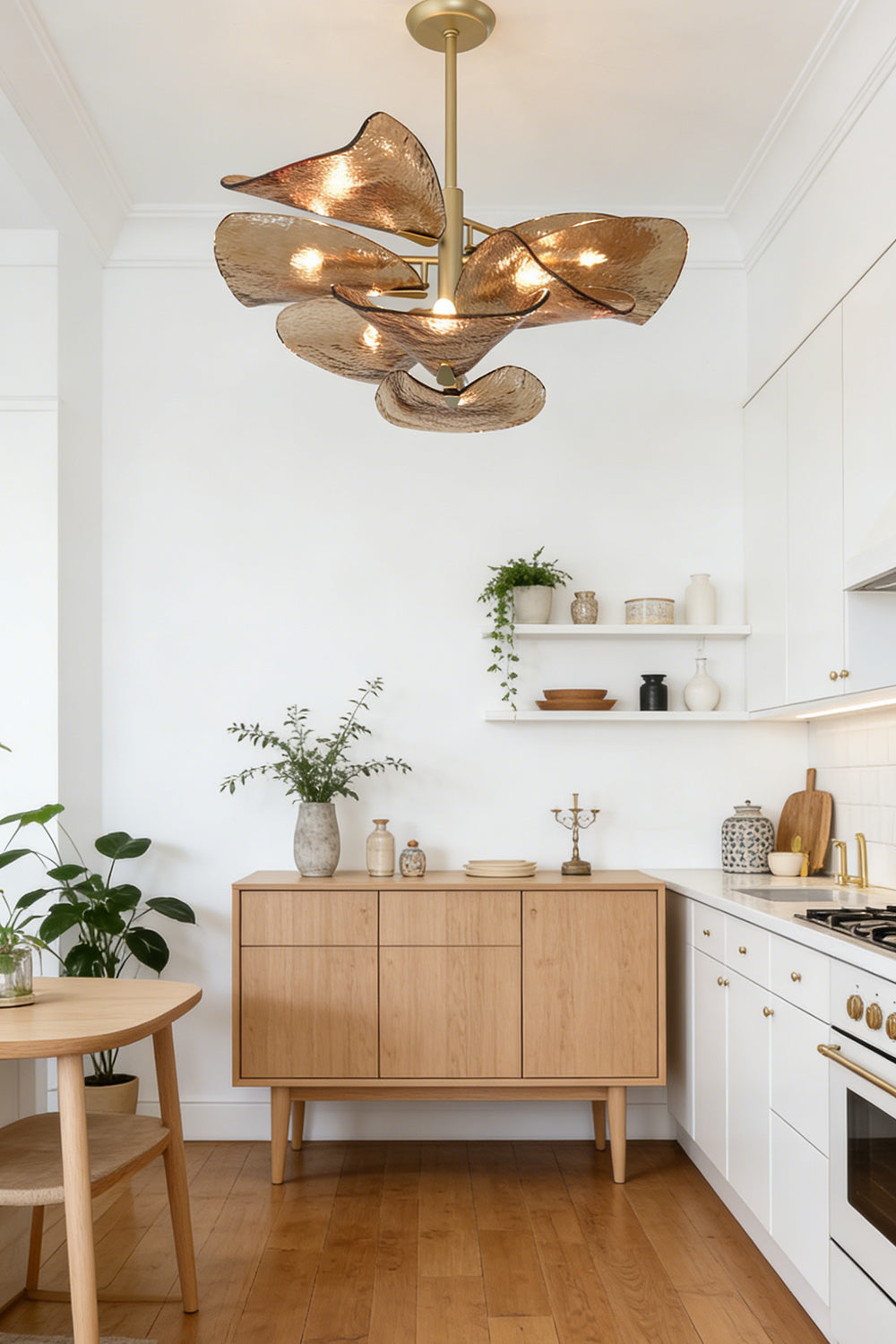 Textured glass wave petal chandelier | Metal, Glass | Hanging in a bright kitchen area above a sideboard | vexa lamps