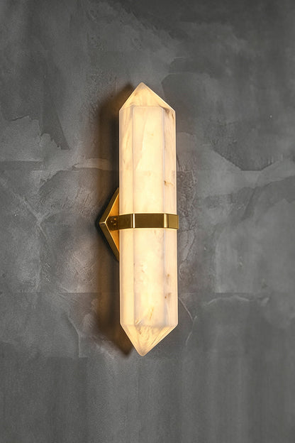 Cassian Faceted Alabaster Wall Sconce showcasing a geometric alabaster column and brass-toned bracket.