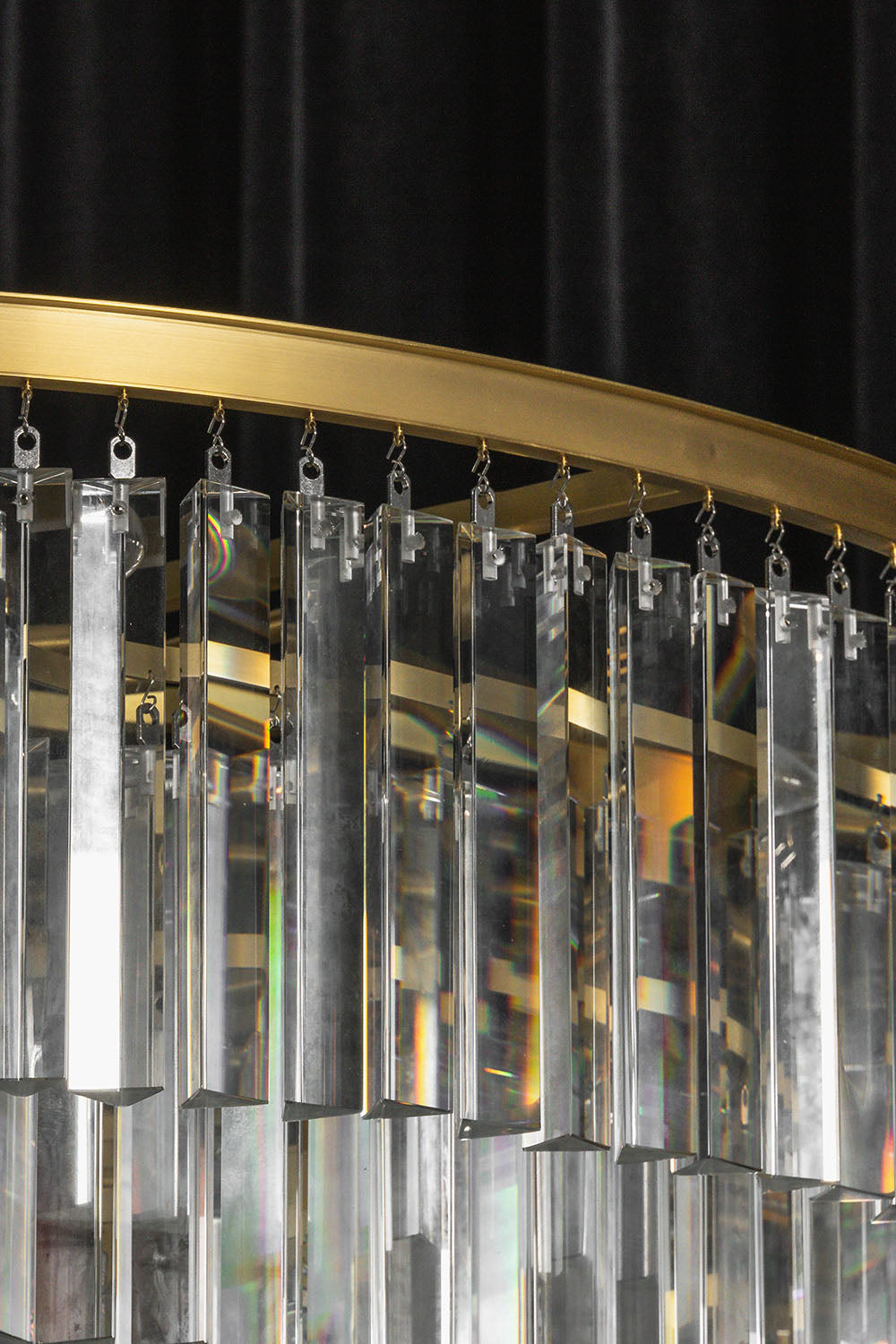 Cassian Tiered Prism Ring Chandelier | Clear Prism Glass and Brass | Side angle detail showcasing cascading layers of clear glass rods | vexa lamps