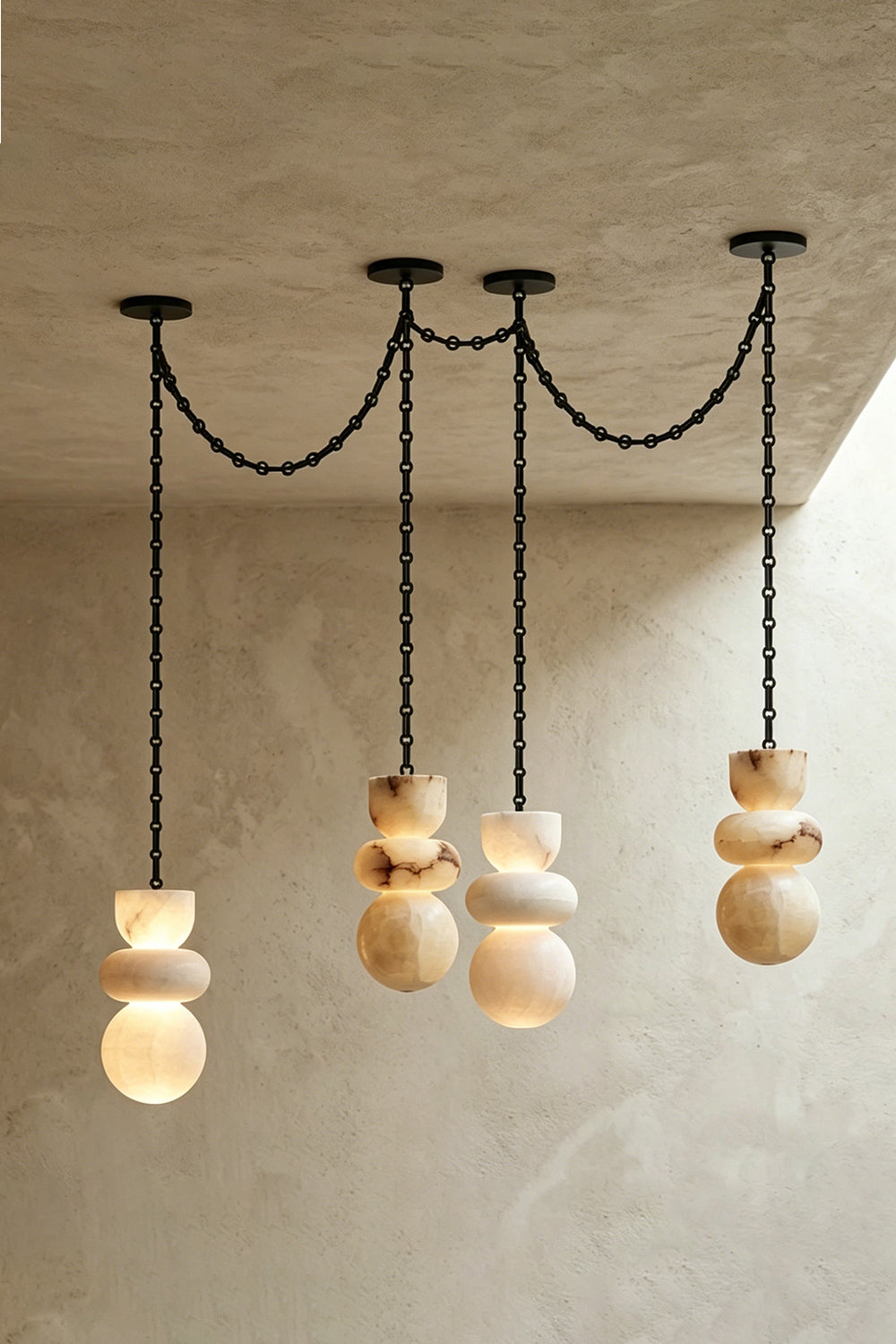 Celestial Alabaster Chandelier | Alabaster, Metal | Linear arrangement of three pendants on plain wall | vexa lamps