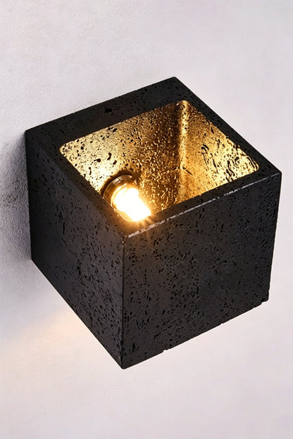 Celestial Tectonic Internal View | Black Travertine | Top-down view of internal bulb and textured gold lining | vexa lamps