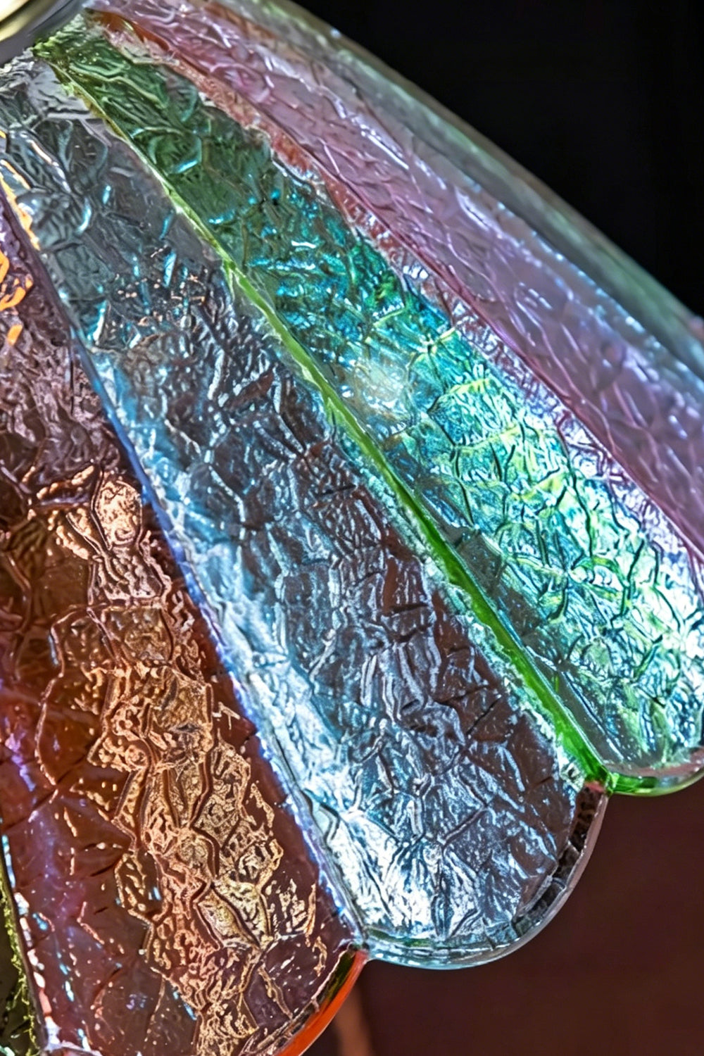 Clara Vintage Pastel Glass Table Lamp | Glass, Metal | Macro view of the iridescent clear, pink, and green striped textured glass panels of the shade | Detail shot | vexa lamps