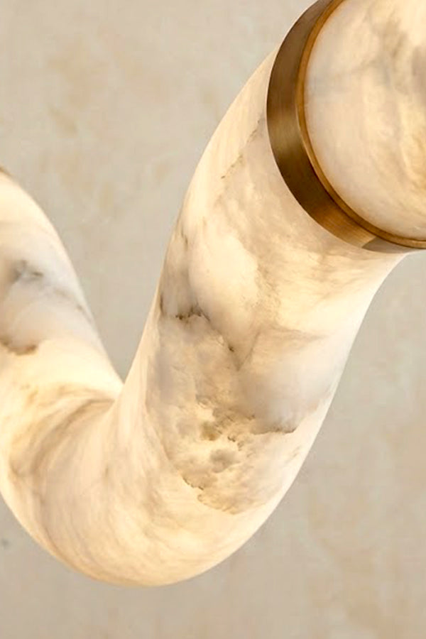Detailed shot of brass joint and alabaster tube connection | Alabaster, Brass | Close-up of the hardware and stone texture | vexa lamps