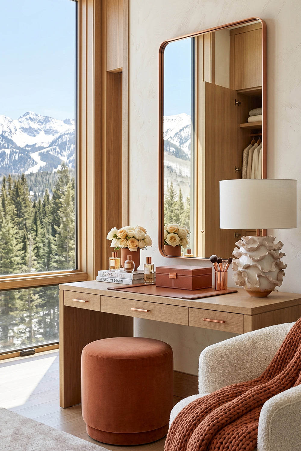Coralia Ruffled Ceramic Table Lamp on a stylish vanity in a mountain view room, featuring a warm and inviting design.