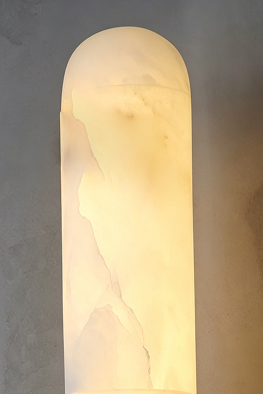 Corin Linear Alabaster Wall Sconce showcasing warm light glows through natural alabaster stone in vertical design.