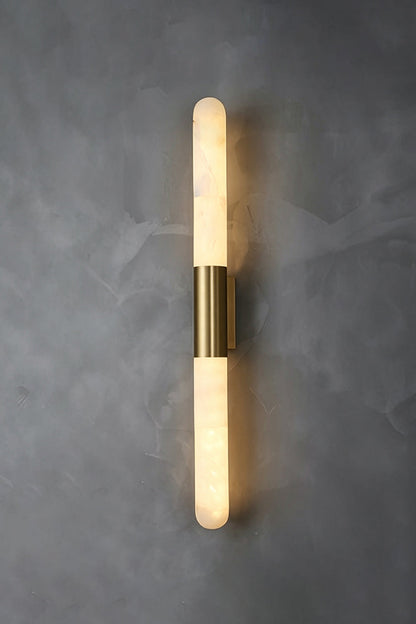 Corin Linear Alabaster Wall Sconce with warm light illuminating through natural alabaster.