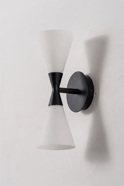 Diabolo Symmetry Glass Wall Sconce featuring dual conical glass shades mounted on a black wall plate.