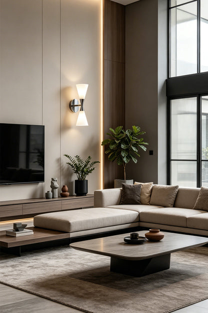 Elegant living room featuring the Diabolo Symmetry Glass Wall Sconce alongside modern furniture and natural elements.