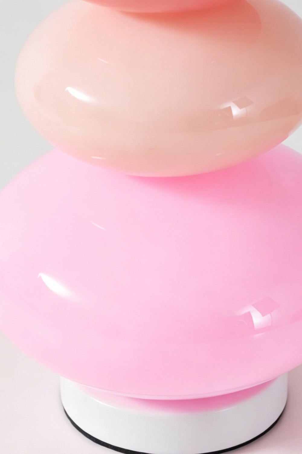 Dolce Stacked Pastel Glass Table Lamp | Glass, Metal | Close-up macro focus on the glossy candy pink and soft magenta glass tiers and white base ring | Detail shot | vexa lamps