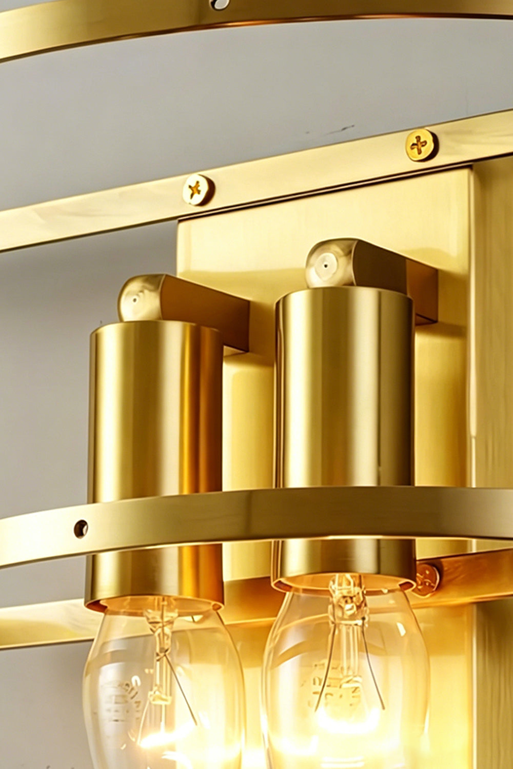 Elowen Cascading Glass Wall Lamp | Glass, Metal | Close-up focus on the internal polished gold brass mount frame structure and dual light bulb sockets | Detail shot | vexa lamps